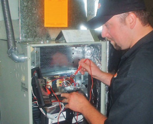 A technician inspecting AC system